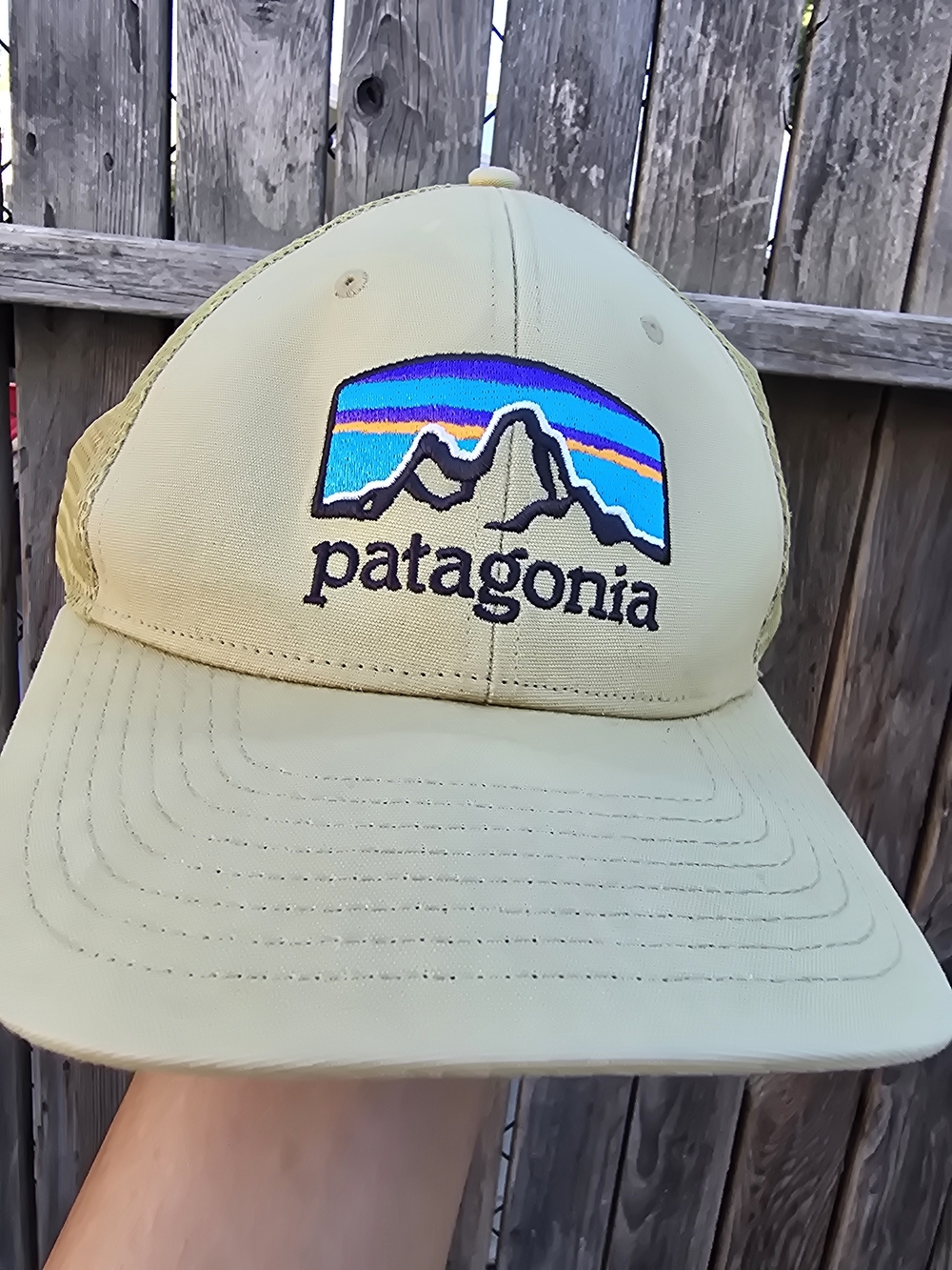 Patagonia Baseball Trucker Hat in Pale Yellow with Blue Logo
